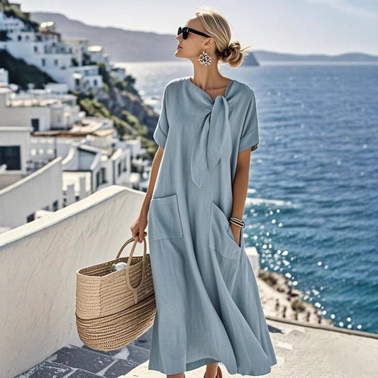 Robe longue élégante à manches courtes – Nœud décoratif, poches et ourlet large
